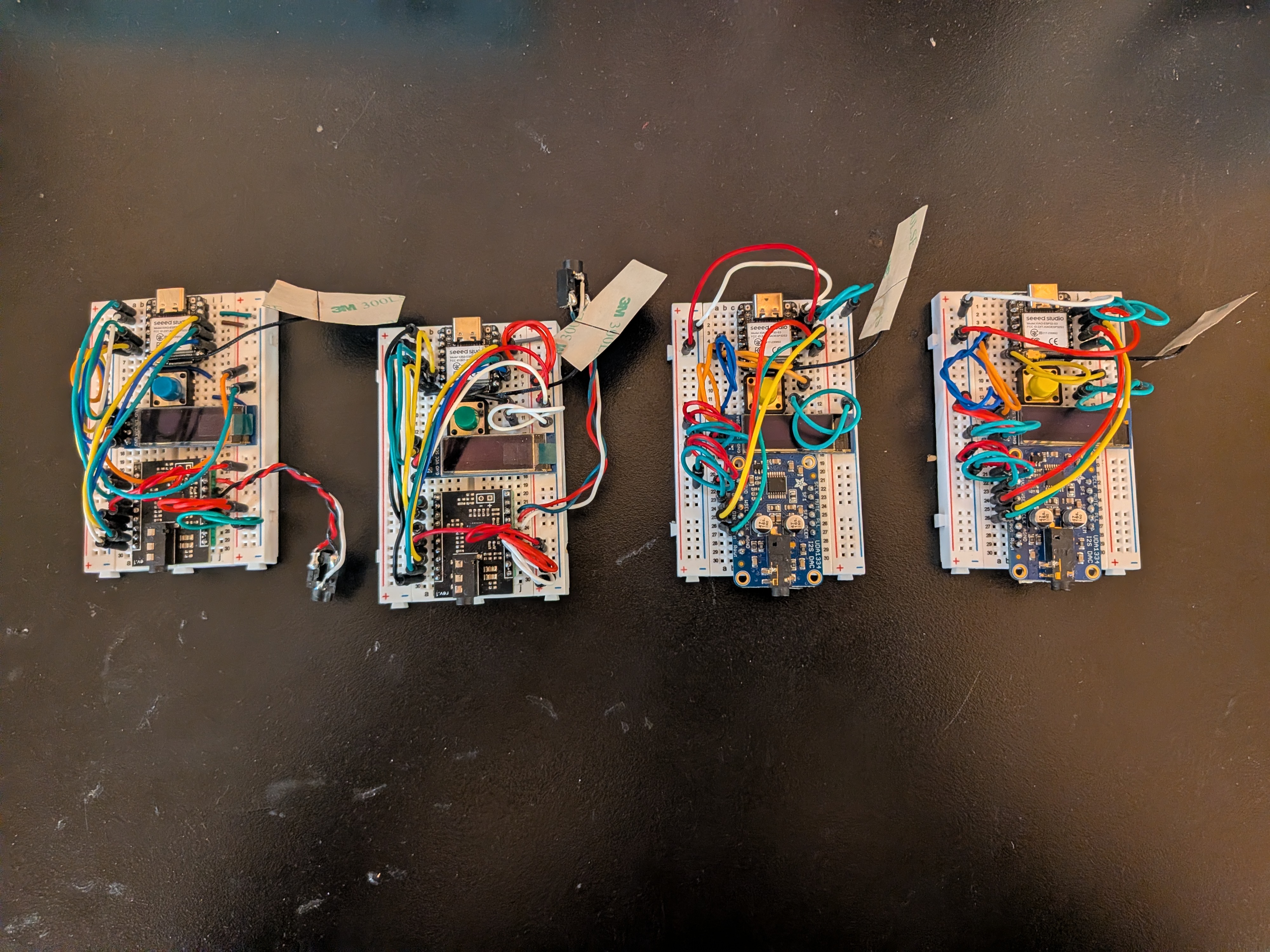 Four breadboards wired together — the current SoundMesh prototype.